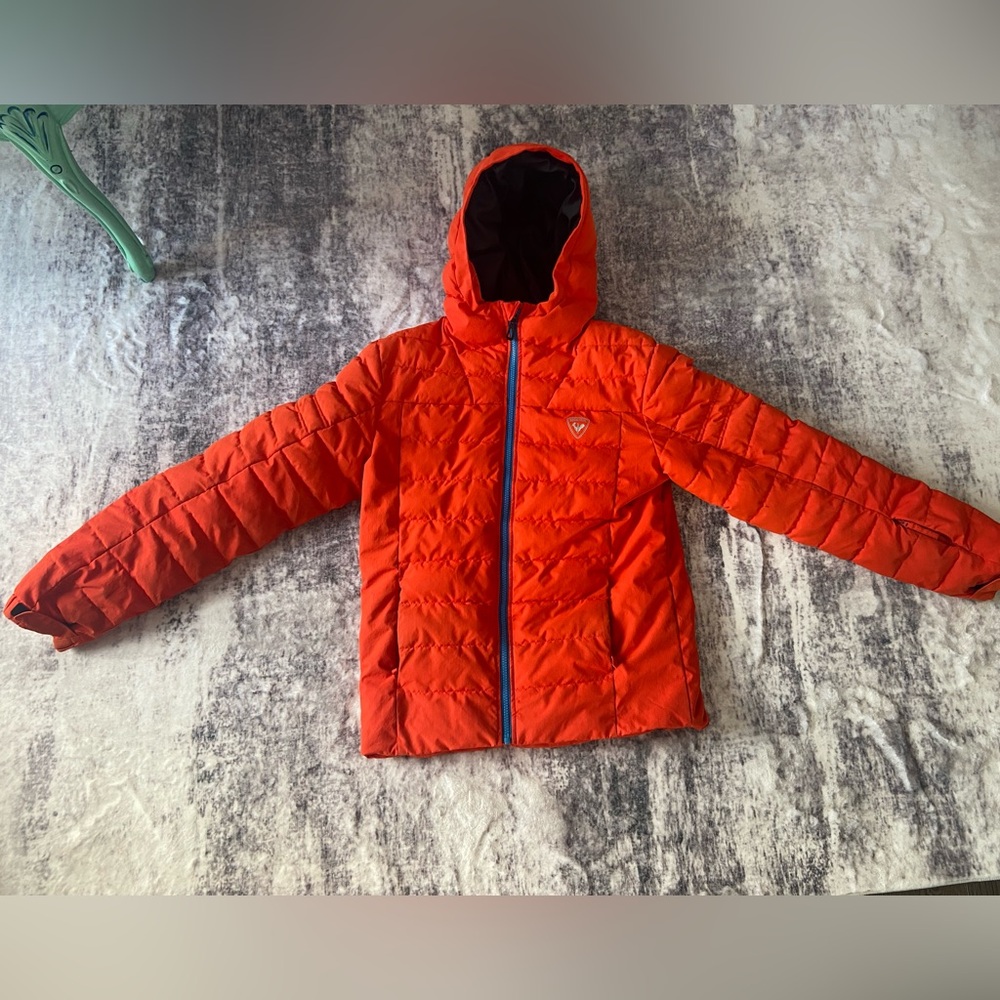 Winter coat for boys, Rossignol brand, size 16 and orange colour.